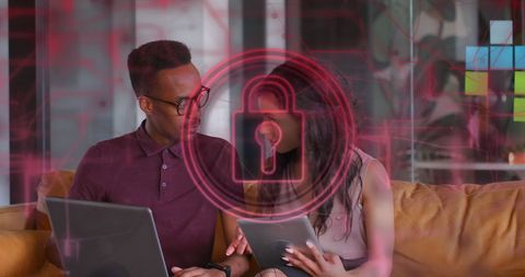 Cybersecurity Focus with Diverse Professionals in Modern Office