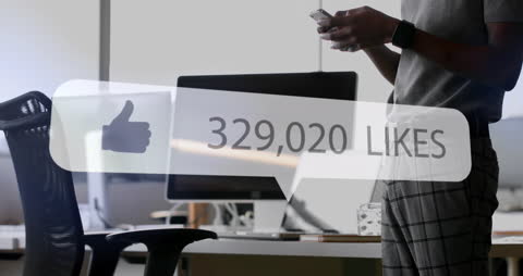 Businessman Checking Engagement Notifications in Modern Office