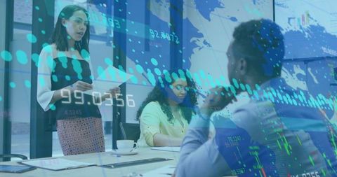 Team Analyzing Financial Trends with Technology in Modern Office