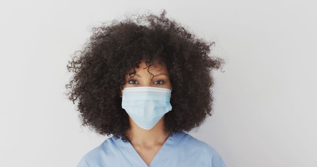 African American Female Doctor Wearing Medical Mask and Scrubs - Download Free Stock Images Pikwizard.com