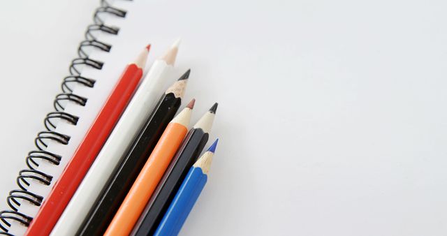 Colored Pencils and Sketchbook on White Background - Download Free Stock Images Pikwizard.com