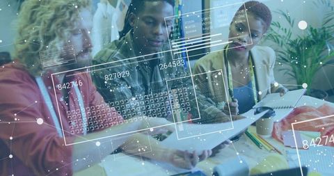 Diverse Team Collaborating on Data Projects in Modern Office