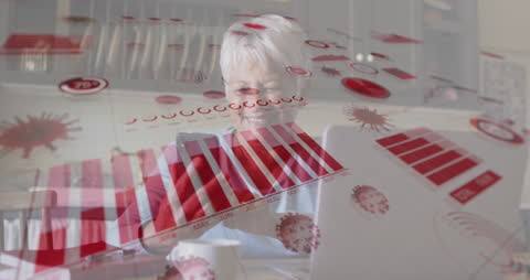 Senior Woman Engaging with Digital Graphs from Home