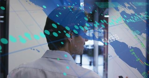 Businessman Analyzing Data on Interactive Screen in Modern Office