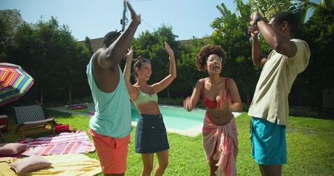 Diverse Friends Celebrating by Backyard Pool in Summer Vibes