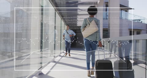 Businesspeople Navigating Modern Workspace with Tech Overlay