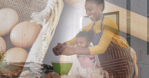 Happy Mother and Daughter Enjoying Family Cooking Time