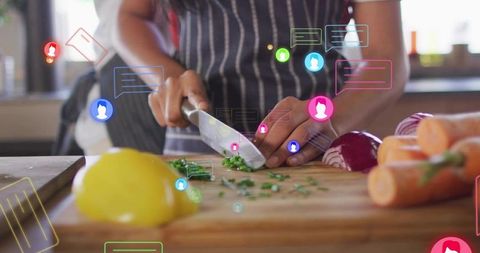 Home Chef Chopping Fresh Herbs on Wooden Board with Knife and Social Media Chat Overlays