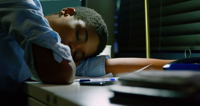 Exhausted Student Asleep at Desk During Late Night Studying - Download Free Stock Images Pikwizard.com