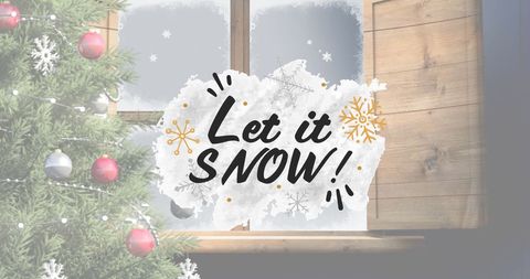 Festive let it snow greeting on winter window scene