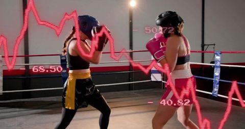 Female boxers sparring in boxing ring with red performance graph overlay showing intensity