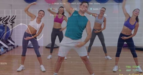 Male instructor leading energetic side-bend fitness class with hud data overlay