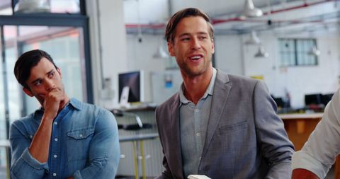 Business executives engaged in office meeting discussion