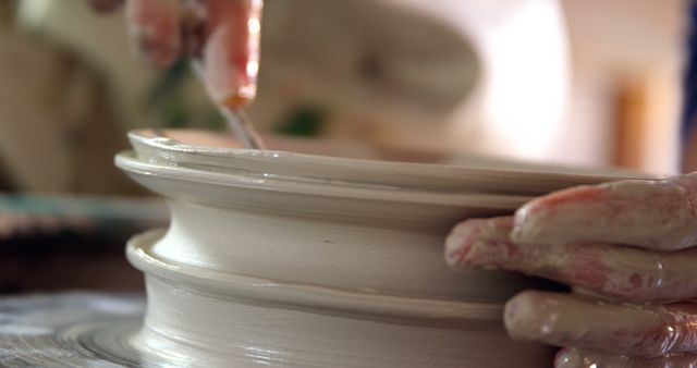 Close-up of Hands Shaping Clay on Pottery Wheel - Download Free Stock Images Pikwizard.com