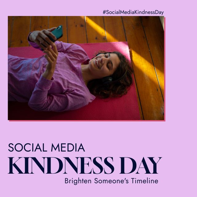 Casual portrait of woman lying on floor using smartphone, enjoying online interaction. Ideal for promoting social media campaigns, kindness initiatives, online engagement strategies, and positive digital communication. Perfect for content that encourages connecting with others globally.