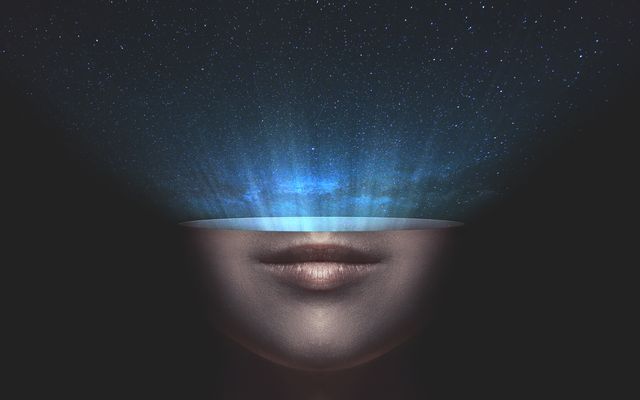 Ethereal and artistic portrait blending lower half of human face with a star-filled sky, creating a dreamlike and imaginative effect. Perfect for use in artistic projects, creative concept art, visual storytelling, and futuristic design themes.
