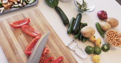 Fresh Vegetables and Cooking Ingredients on Kitchen Counter