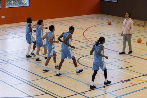 Dynamic Footwork Drill with Diverse Basketball Team