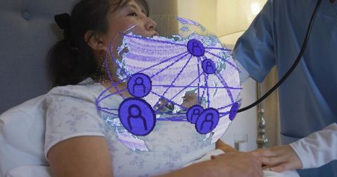 Clinician Checking Patient with Stethoscope at Bedside with Telemedicine Network Overlay