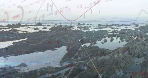 Rocky tidal shoreline reflecting tide pools with overlaid financial charts and data lines