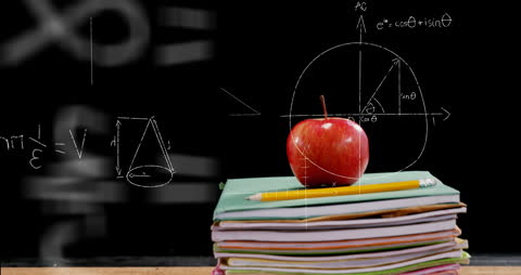 Education Concepts with Books, Apple, and Math Equations