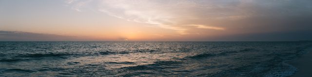Panoramic View of Serene Ocean at Sunset - Download Free Stock Photos Pikwizard.com