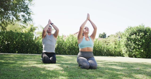 Man and Woman Practicing Yoga Outdoors in Park - Download Free Stock Images Pikwizard.com