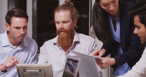 Diverse Team Collaborating in Serious Business Discussion