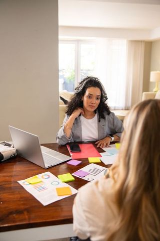 Modern Workspace Collaboration with Diverse Female Colleagues