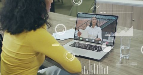 Businesswomen Collaborating in Virtual Data Meeting