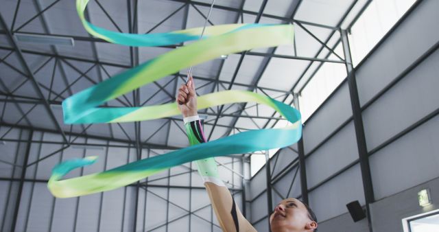 Professional Rhythmic Gymnast Practicing Indoors with Ribbon - Download Free Stock Images Pikwizard.com