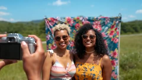 Capturing Candid Friendship in Meadow Portrait Setting