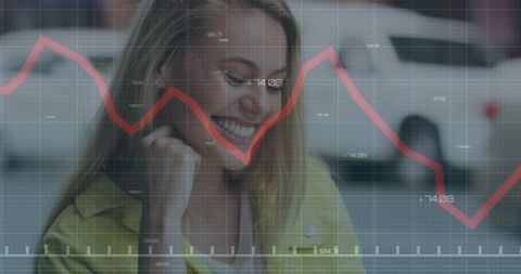 Smiling Woman Engaged with Smartphone Amidst Financial Graph Overlay