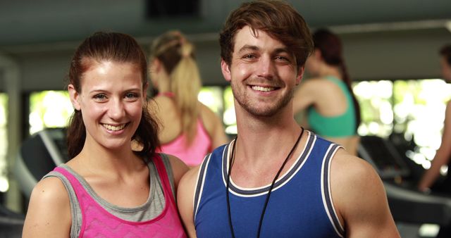 Young Fitness Instructors Smiling at Gym - Download Free Stock Images Pikwizard.com