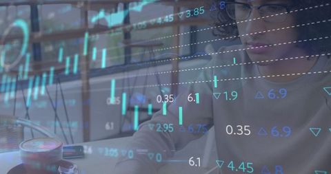 Businessman Analyzing Financial Data Overlay on Computer Screen