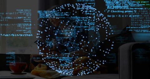 Remote developer coding on smartphone under yellow blanket with holographic code globe