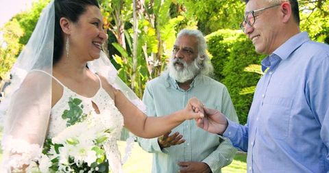 Bride Greeting Guests During Outdoor Wedding Ceremony