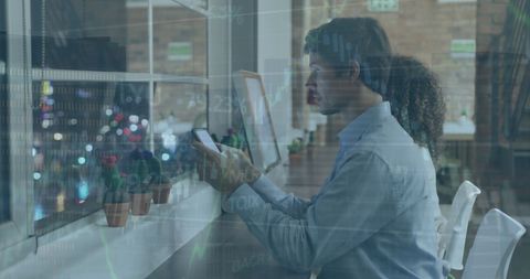 Business people analyzing financial data on digital devices