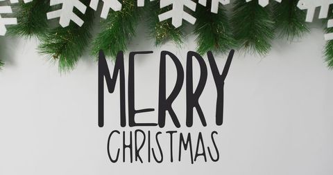 Festive Merry Christmas Greeting Over Greenery