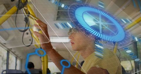 Man using futuristic holographic interface on city bus