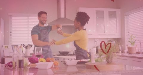 Joyful Couple Dancing Together in Cozy Kitchen