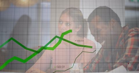 Diverse coworkers discussing market trends in office concept