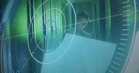 Engineer Analyzing Blueprints with Digital Radar Interface