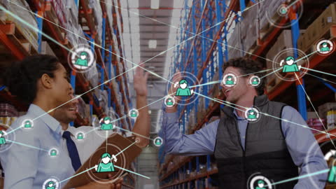 Diverse Supervisors Celebrating Achievement in Warehouse