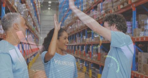 Volunteers Collaboration in Logistics Warehouse with Data Overlay - Download Free Stock Images Pikwizard.com