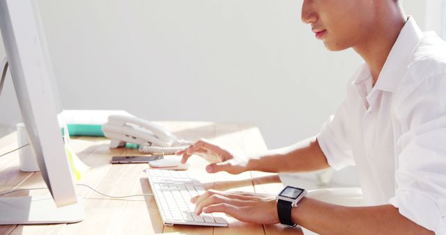 Young Professional Typing on Keyboard in Bright Office - Download Free Stock Images Pikwizard.com