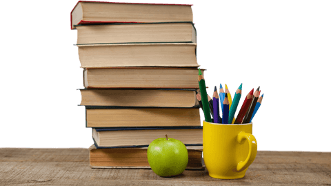 Transparent stack of books with colorful pencils and green apple