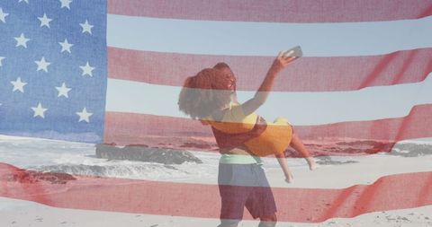 Celebrating Freedom: Couple Enjoying a Beach Day with American Flag Overlay