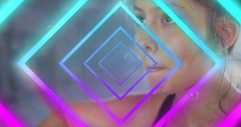 Posing woman with neon holographic diamond tunnel overlay, fashion portrait, futuristic