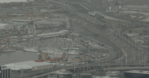aerial view of busy urban harbor with transparent horizon - Download Free Stock Videos Pikwizard.com